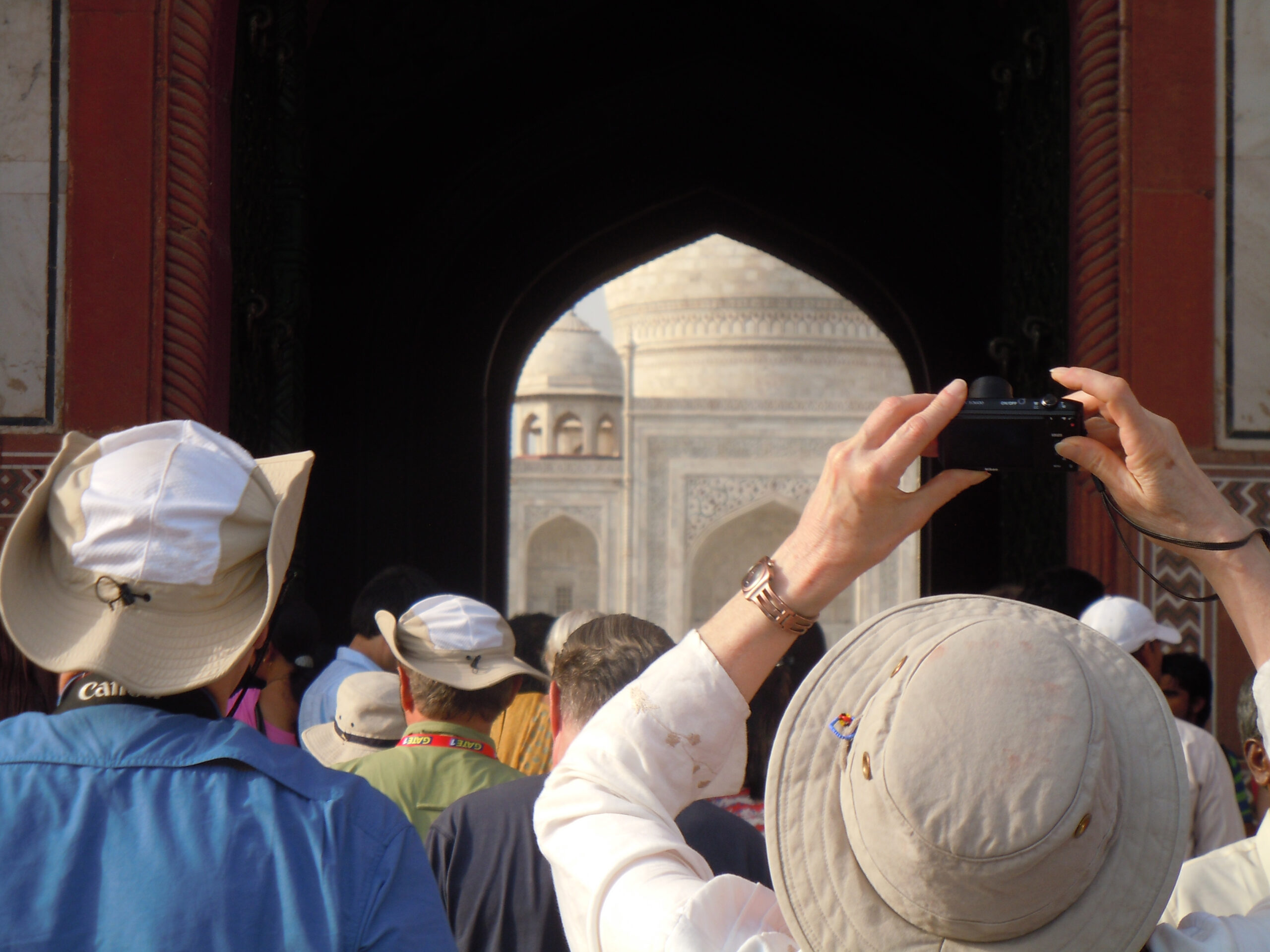 group people clicking photo taj mahal scaled